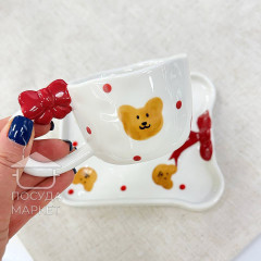 Чашка з блюдцем 220 мл "Банти і мішки" ручної роботи білого кольору, кераміка